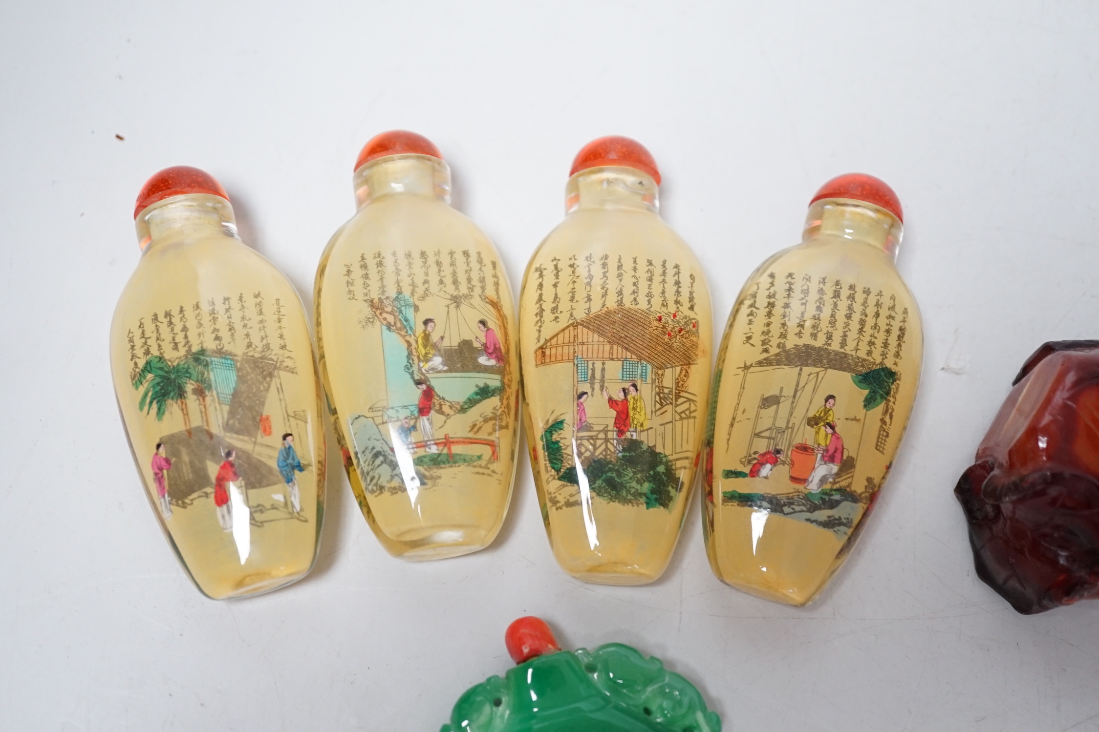 A group of Chinese snuff bottles, tallest 8.5cm including stopper